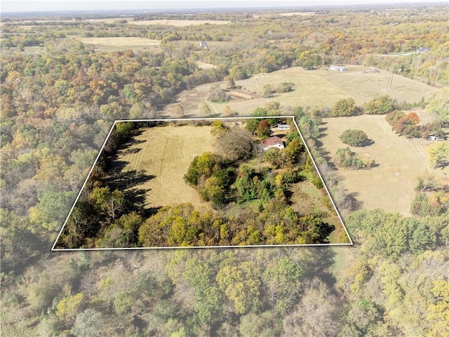 bird's eye view featuring a forest view