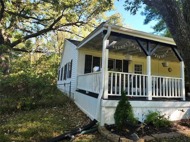 view of home's exterior featuring a porch