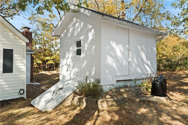 entry to storm shelter with an outdoor structure
