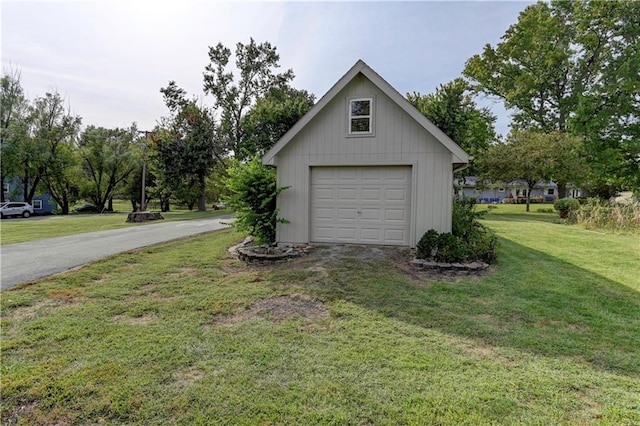 garage with a yard