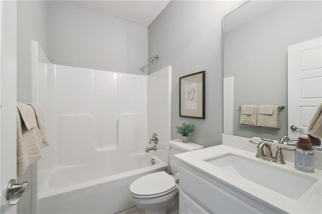 full bathroom with vanity, toilet, and washtub / shower combination