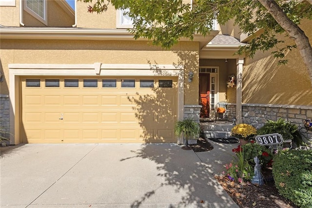 property entrance with a garage