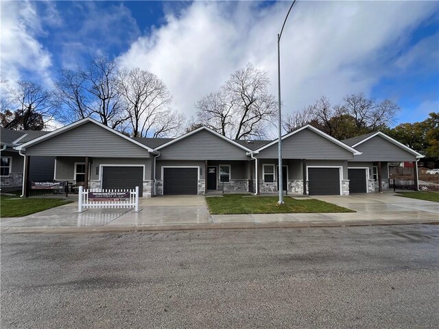 ranch-style house featuring a garage