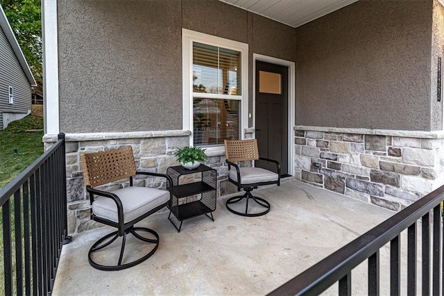 5830 Hunter Ct, Raytown, MO 64133 - view of patio / terrace with a balcony