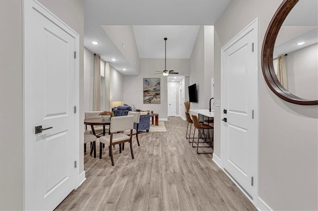 5830 Hunter Ct, Raytown, MO 64133 - interior space featuring baseboards, a ceiling fan, recessed lighting, and light wood finished floors
