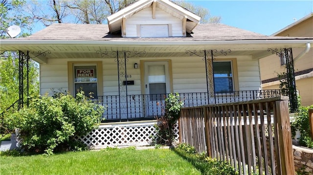 view of front of home featuring covered porch