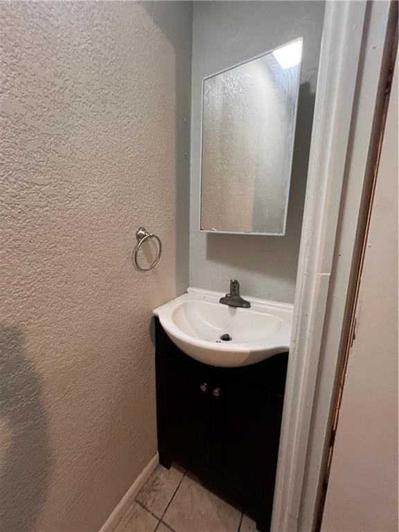 bathroom with vanity and tile patterned floors