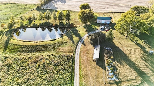 bird's eye view with a rural view and a water view