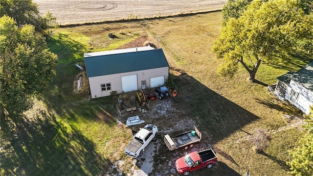 birds eye view of property featuring a rural view