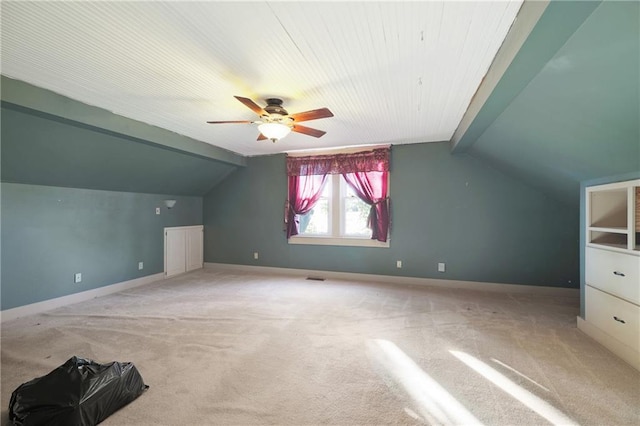 bonus room with ceiling fan, lofted ceiling, and light colored carpet