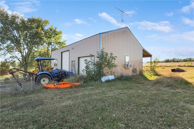 exterior space with a lawn and a garage