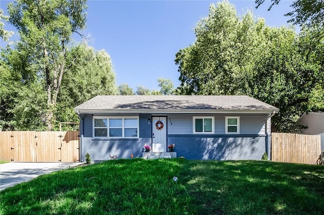 ranch-style house with a front yard