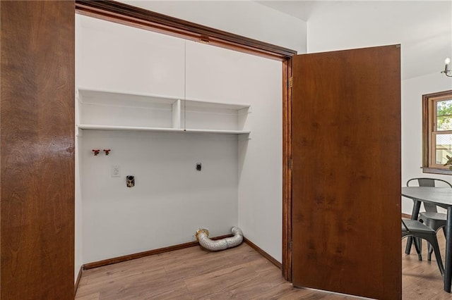 3438 N 123rd St, Kansas City, KS 66109 - laundry room featuring laundry area, wood finished floors, baseboards, electric dryer hookup, and washer hookup