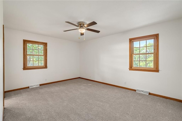 3438 N 123rd St, Kansas City, KS 66109 - carpeted empty room with baseboards and visible vents