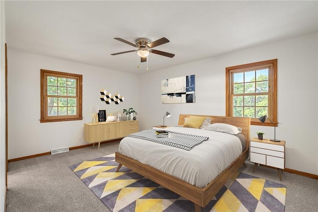 3438 N 123rd St, Kansas City, KS 66109 - bedroom featuring baseboards, visible vents, carpet, and ceiling fan