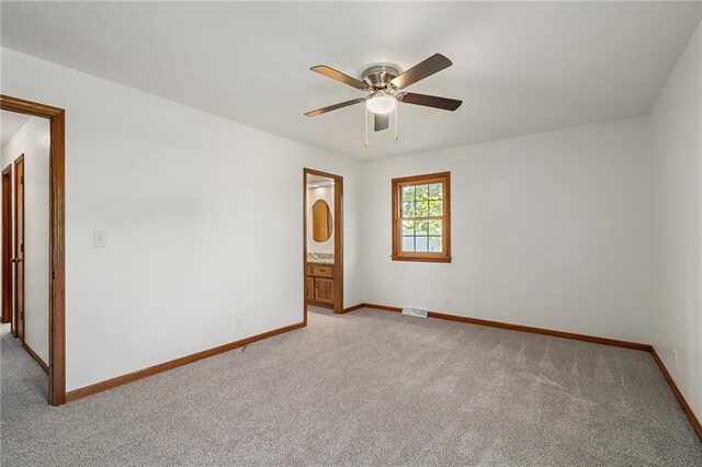 3438 N 123rd St, Kansas City, KS 66109 - unfurnished room with light colored carpet, ceiling fan, baseboards, and visible vents