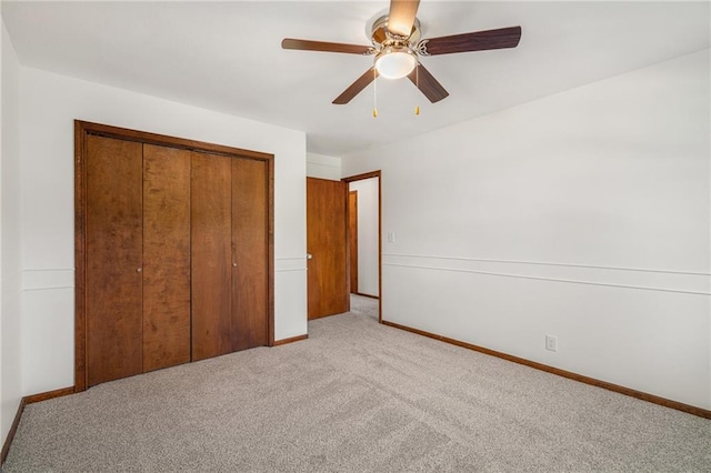3438 N 123rd St, Kansas City, KS 66109 - unfurnished bedroom featuring a ceiling fan, baseboards, a closet, and light colored carpet
