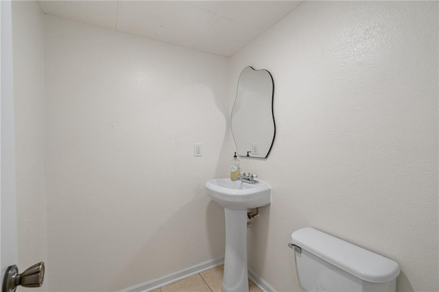 3438 N 123rd St, Kansas City, KS 66109 - half bath featuring baseboards, toilet, and tile patterned flooring
