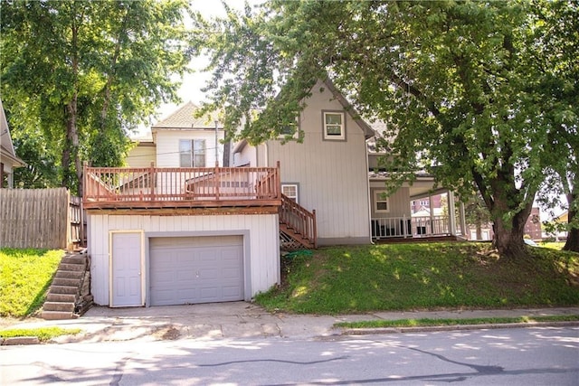 view of front of house with a front lawn and a garage