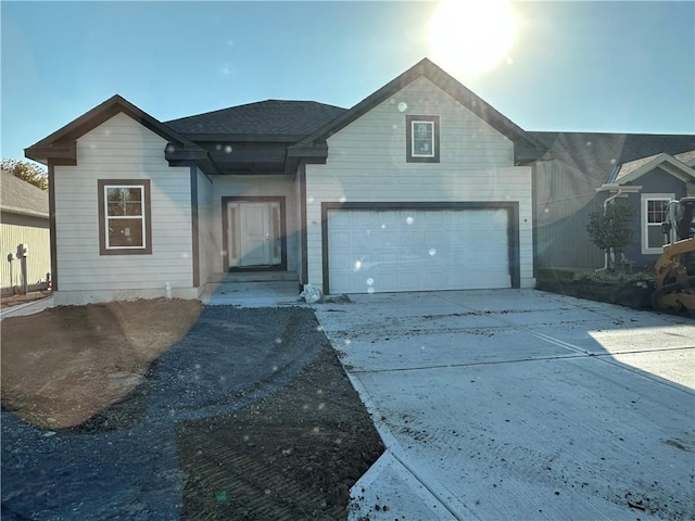 view of front of property featuring a garage