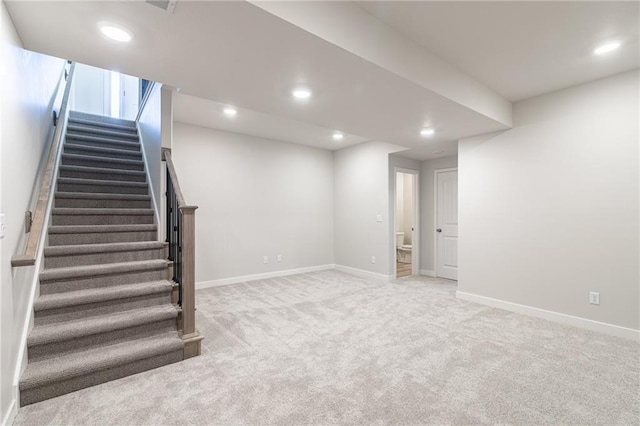 basement with carpet flooring