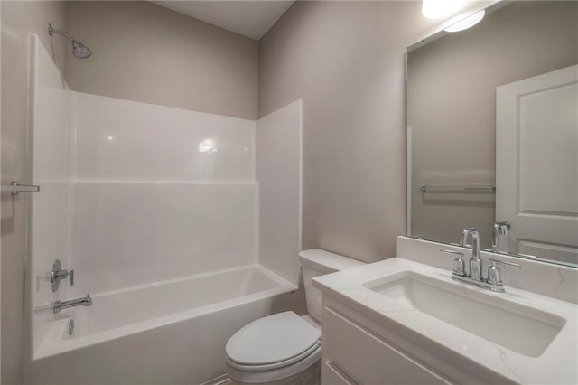 full bathroom featuring bathing tub / shower combination, vanity, and toilet