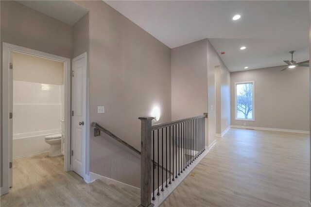 hall with light wood-type flooring