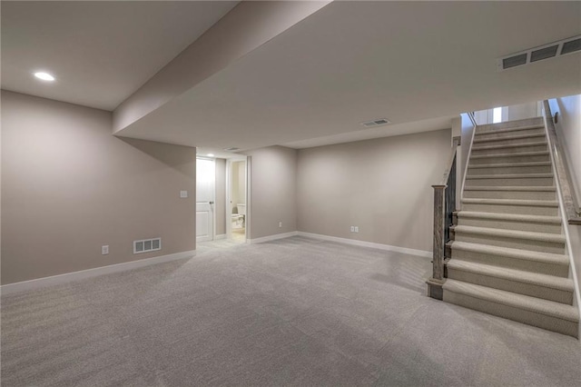 basement featuring carpet flooring