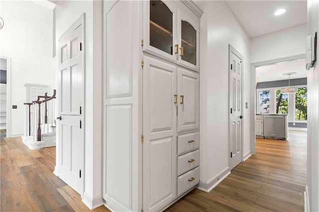 hallway featuring dark wood-type flooring