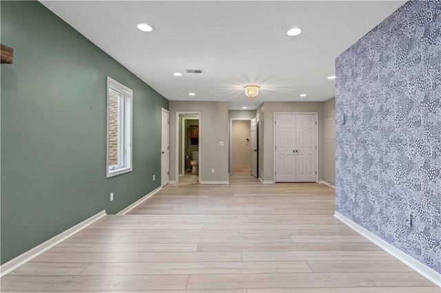 empty room featuring light wood-type flooring