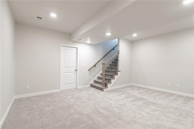 basement with light carpet