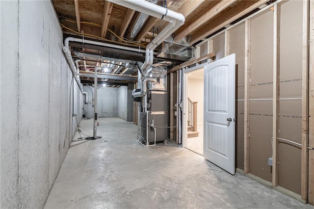 basement featuring heating unit