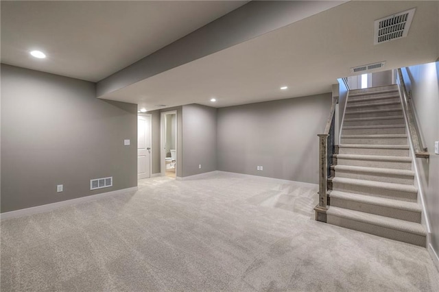 basement featuring carpet floors