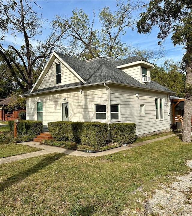 view of property exterior featuring a yard