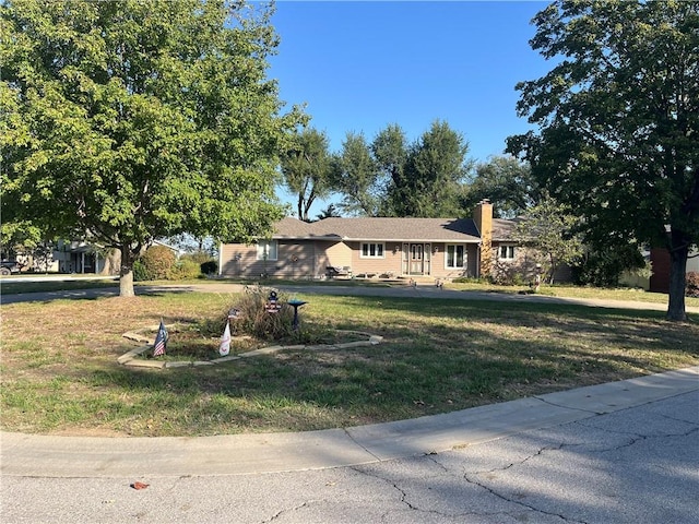 view of front of house featuring a front yard