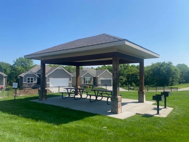 view of home's community with a gazebo and a lawn