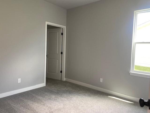 20870 W 190th Ter, Spring Hill, KS 66083 - spare room featuring carpet flooring and baseboards