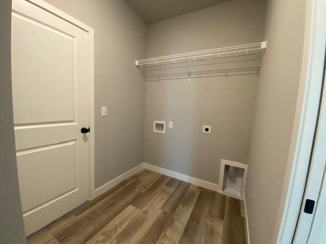 20870 W 190th Ter, Spring Hill, KS 66083 - laundry room featuring hookup for an electric dryer, wood finished floors, and washer hookup