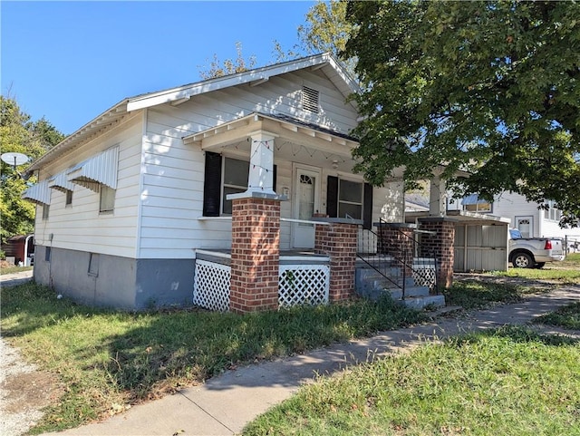 bungalow-style house featuring covered porch