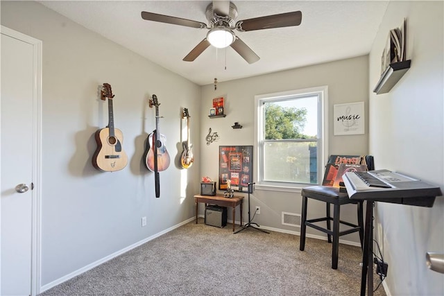 miscellaneous room featuring ceiling fan and light colored carpet