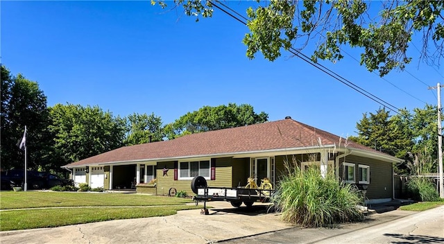 ranch-style home with a porch and a front yard