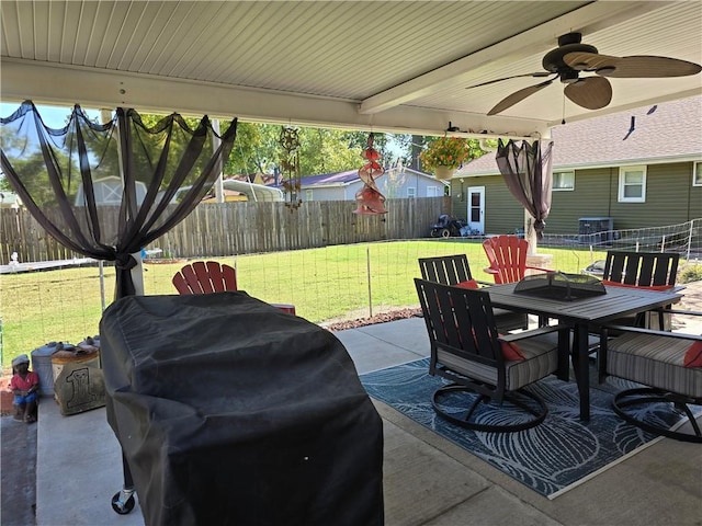 view of patio with ceiling fan and grilling area