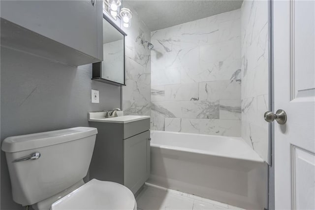 full bathroom with vanity, toilet, and tiled shower / bath