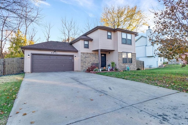 view of front facade featuring a garage and a front lawn