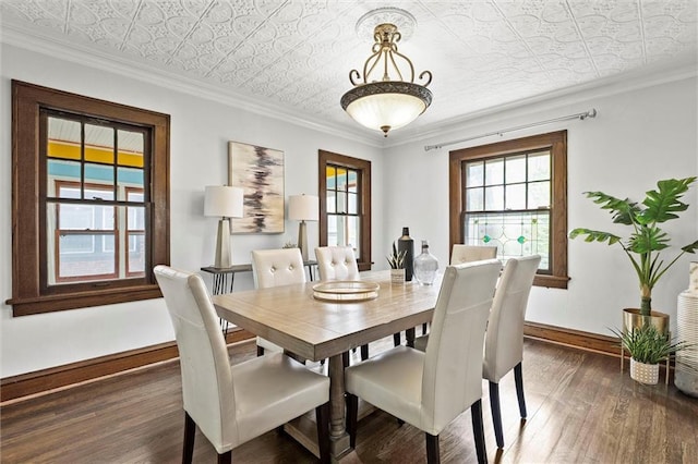 507 E 75th St, Kansas City, MO 64131 - dining space featuring crown molding, wood finished floors, an ornate ceiling, and baseboards