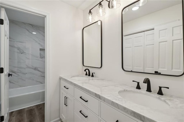 bathroom with vanity and hardwood / wood-style floors