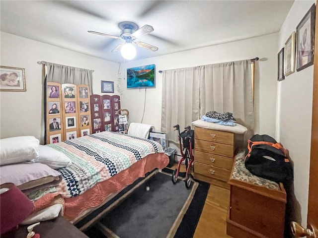 31688 Highline Dr, Warsaw, MO 65355 - bedroom with ceiling fan and wood finished floors