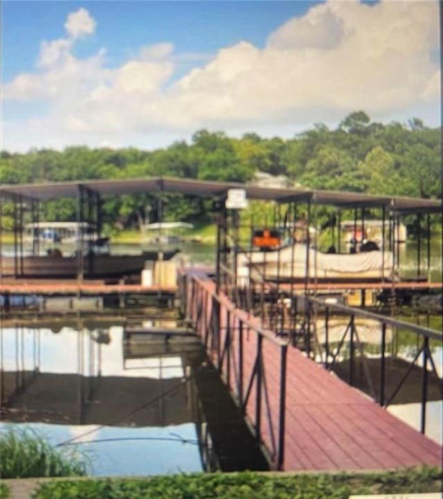 31688 Highline Dr, Warsaw, MO 65355 - dock area featuring a water view and boat lift