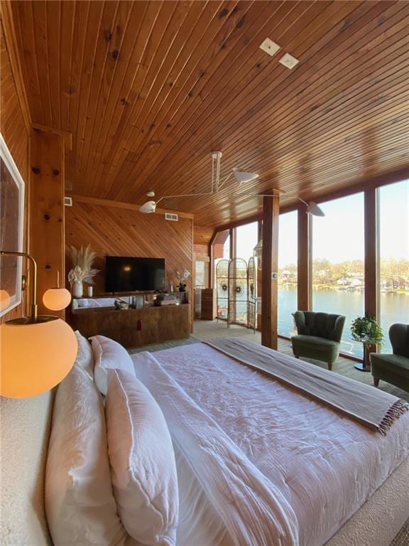 bedroom featuring wood ceiling and wooden walls