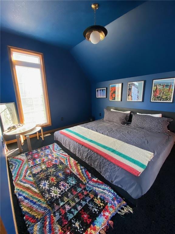 bedroom featuring vaulted ceiling